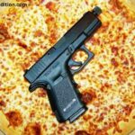 Gun Goes off in Pizza