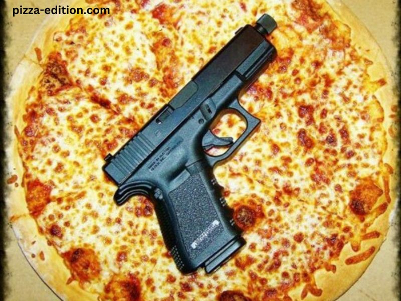 Gun Goes off in Pizza