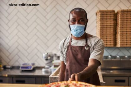 Man Wearing Slice Pizza for a Mask