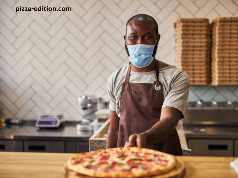 Man Wearing Slice Pizza for a Mask